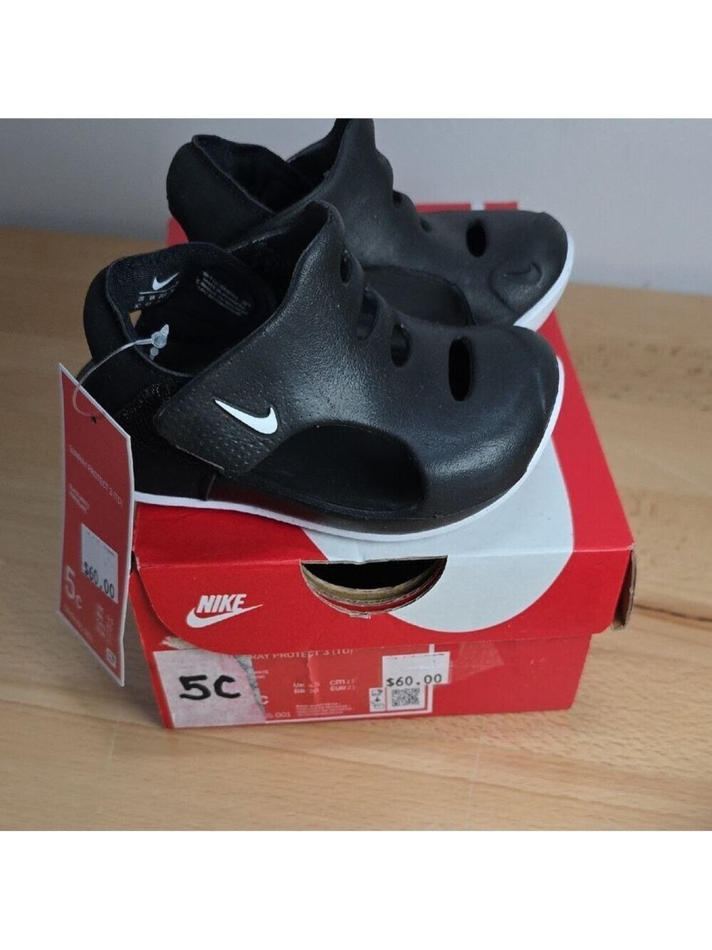 Nike Black and White Sandals for Versatile Comfort